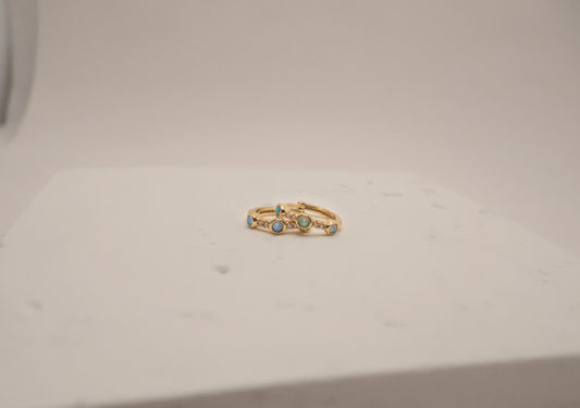 The Aura Pavé & Opal Huggies