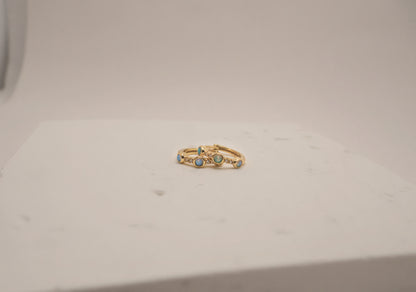 The Aura Pavé & Opal Huggies