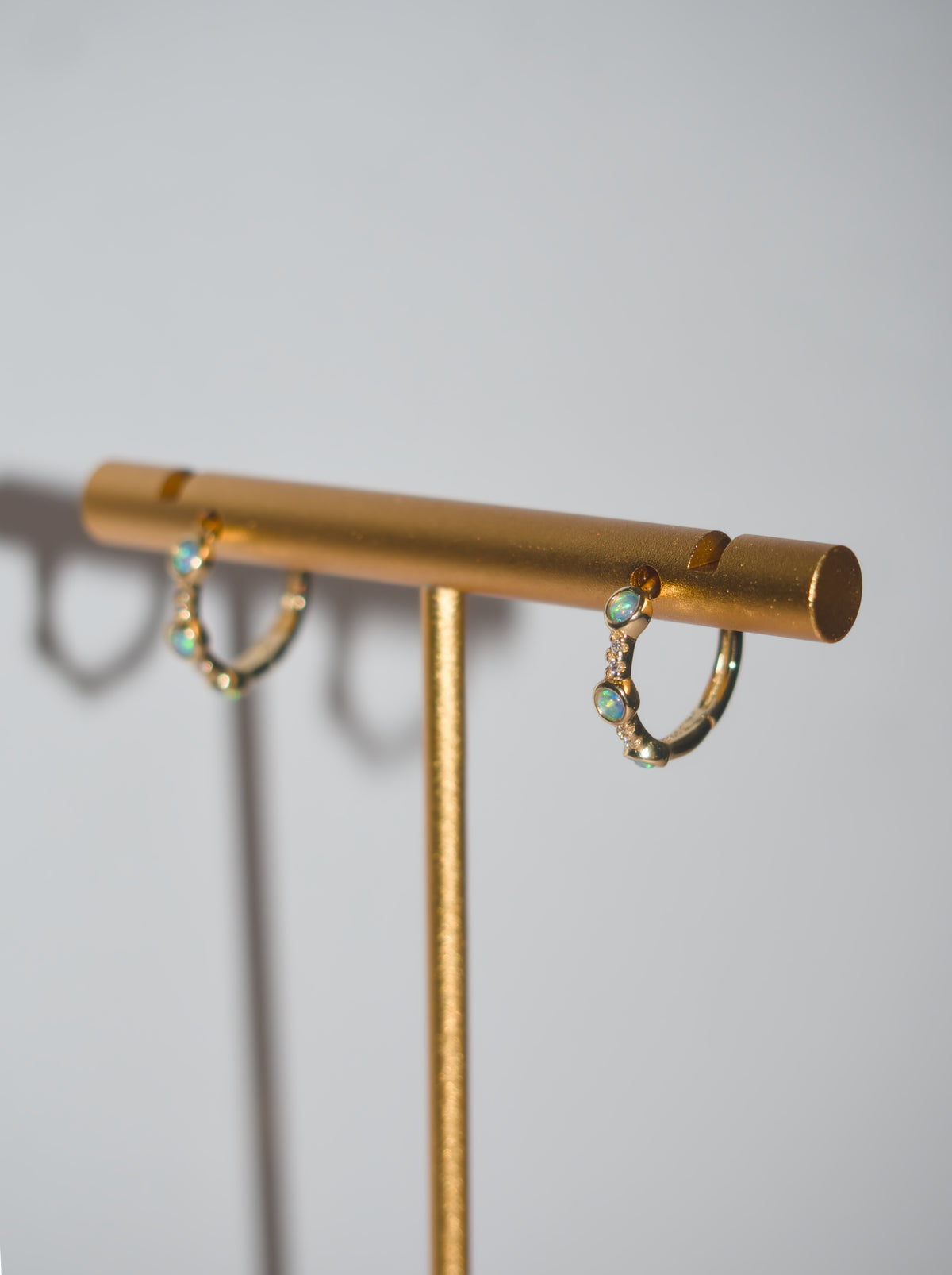 The Aura Pavé & Opal Huggies
